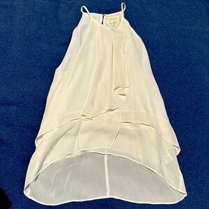 Women’s Nicole Miller Artelier silk cream colored top. Excellent condition.